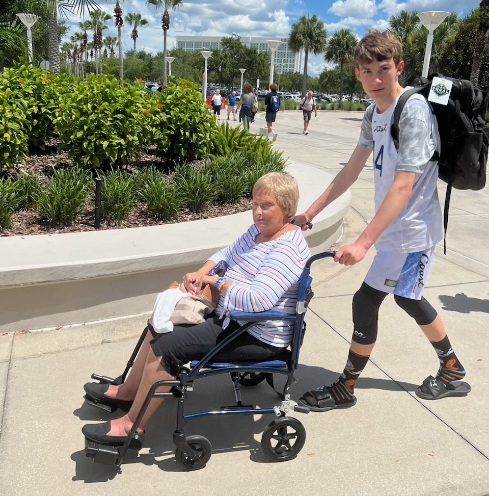 Dash wheeling mom into volleyball